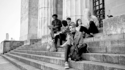 About Us- Group of students at university black and white