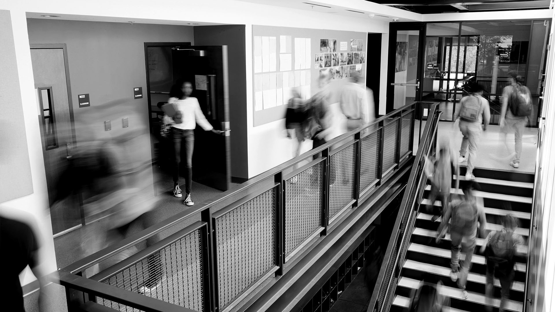 Crisis management Plans- people walking in hallway black and white