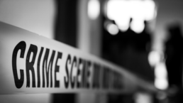 black and white photo of crime scene tape