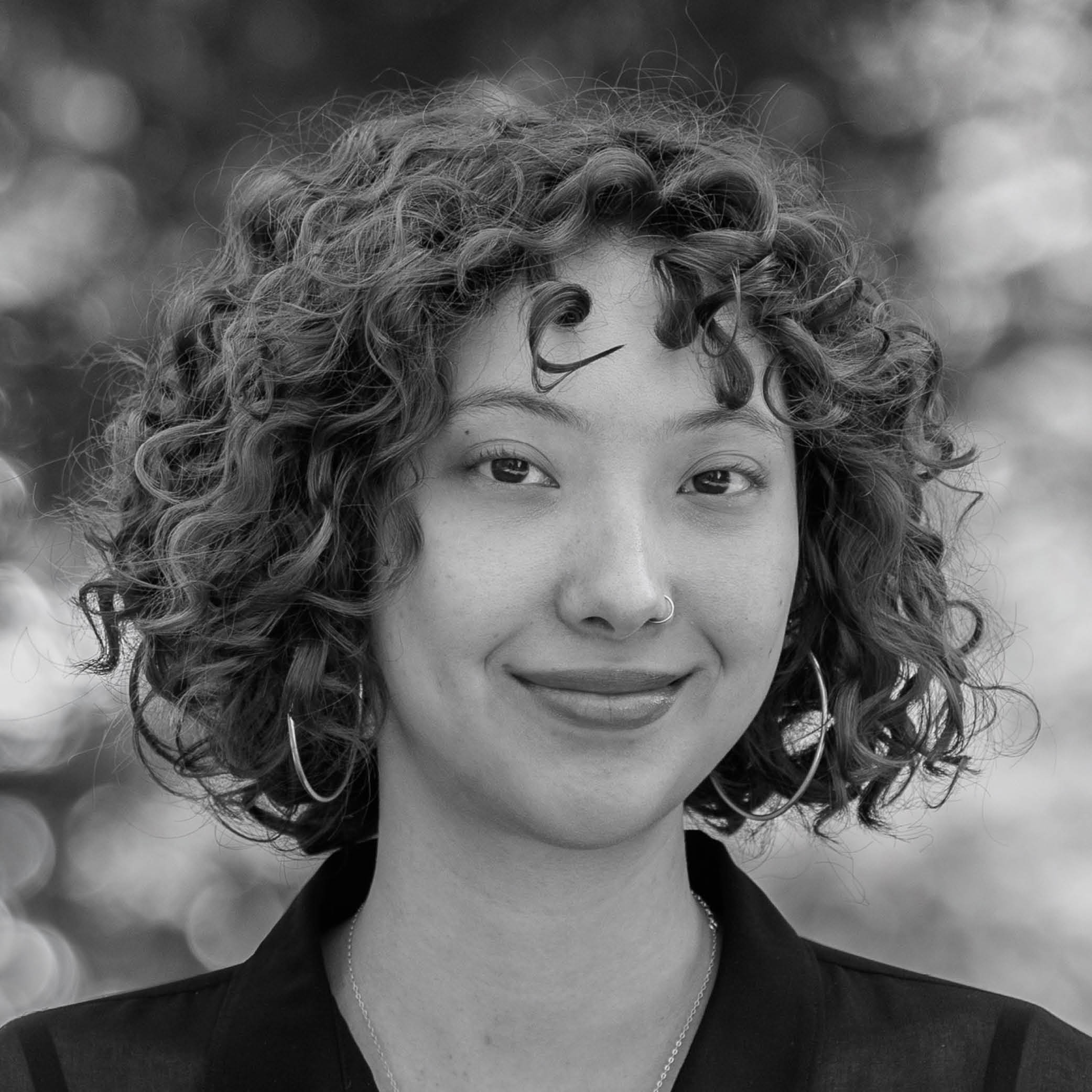 Our Team- Black and white picture of Taliah Churchill