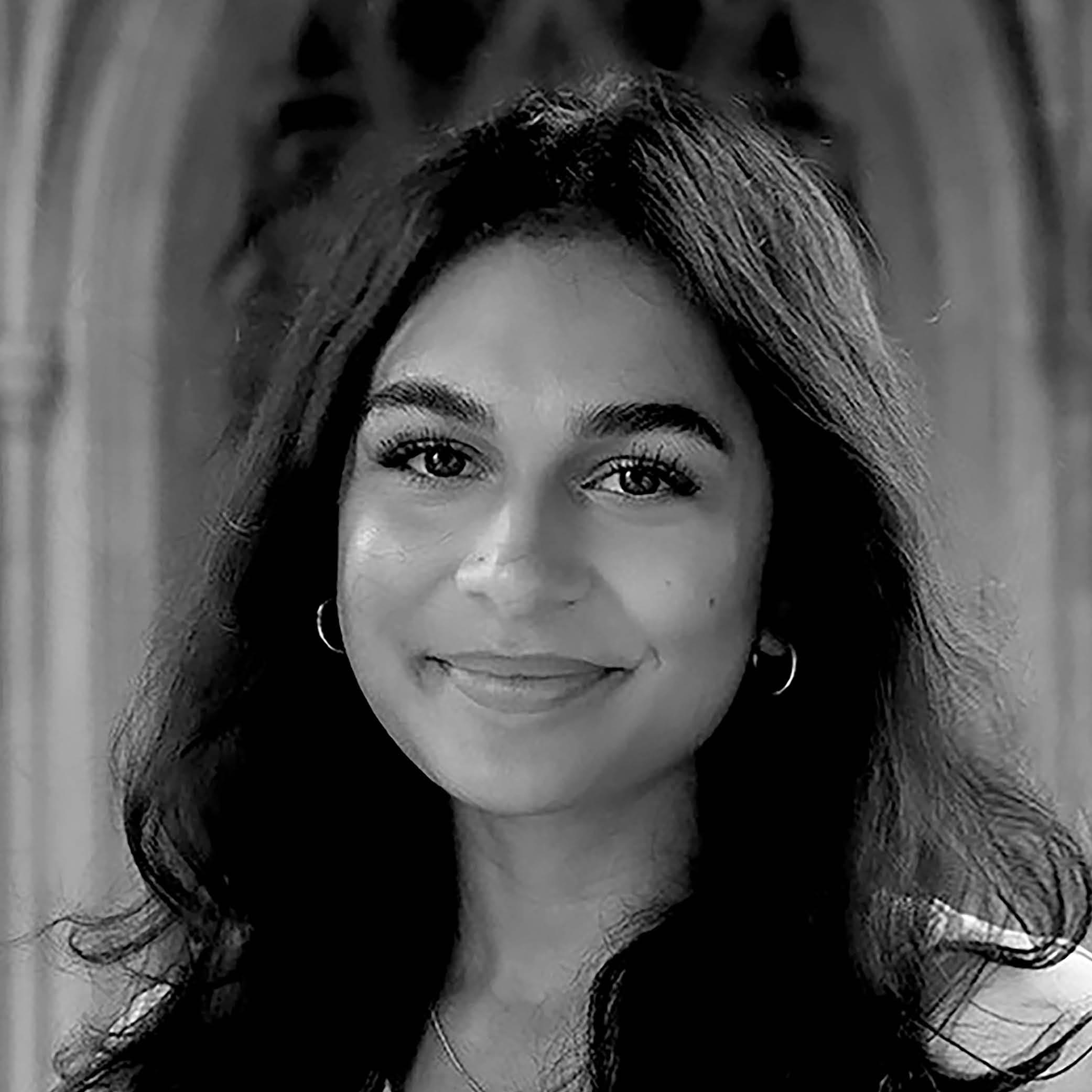 Our Team- Black and white picture of Maya Pandey